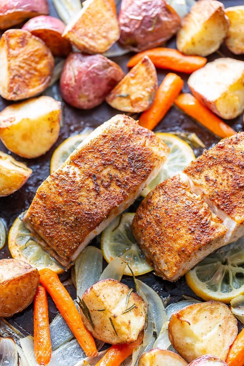 Baked fish and vegetables on a sheet pan