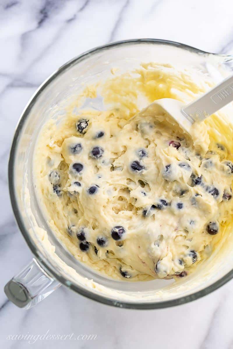 Blueberry muffins batter with a spatula