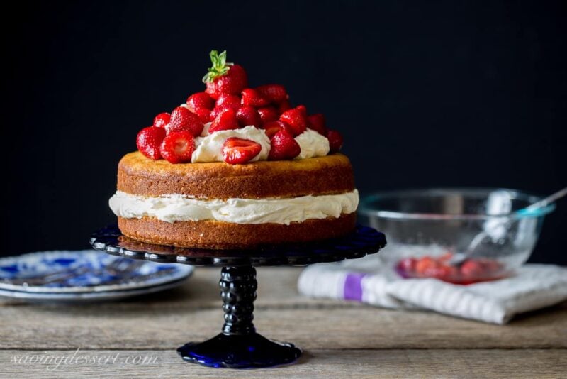 Fresh Strawberry Mascarpone Cake on a cake platter