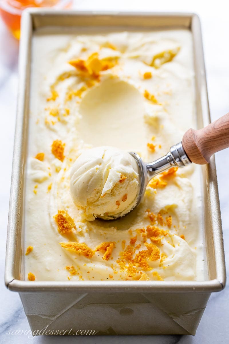 A pan of homemade ice cream with a scoop