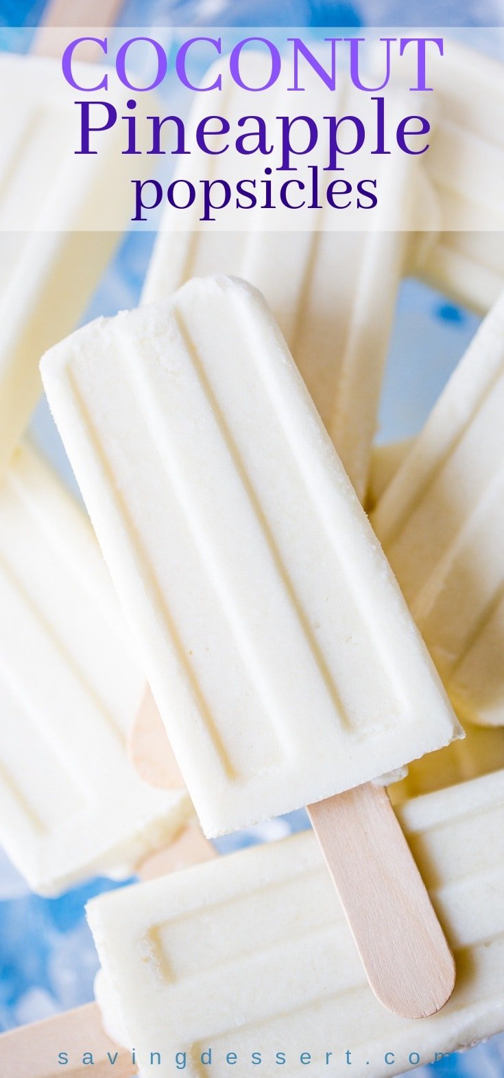 A stack of creamy white coconut pineapple popsicles