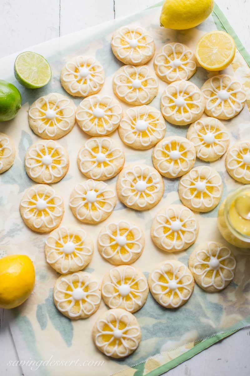 Lemon-Lime Shortbread Thumbprint Cookies with a flower design made of icing