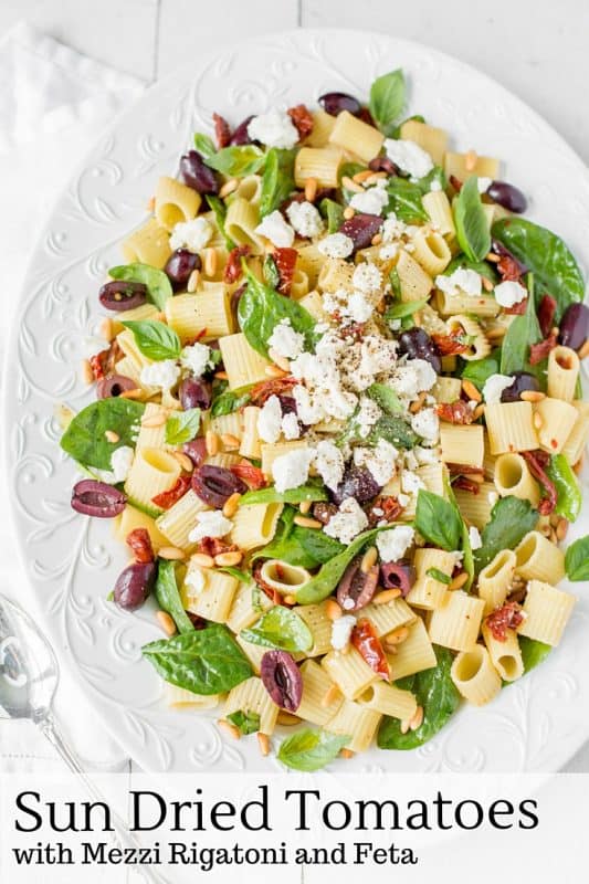 Sun Dried Tomatoes with Mezzi Rigatoni and Feta. Add fresh spinach, basil, olives and pine nuts for an amazing meatless main or hearty side!