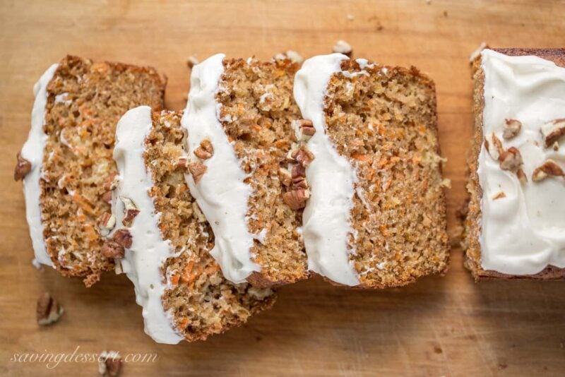 Carrot Loaf Cake - a deliciously moist cake loaded with fresh grated carrots and crushed pineapple, all topped off with a silky smooth cream cheese icing | www.savingdessert.com