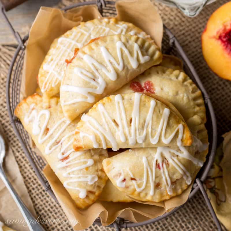 A close up of Peach Hand Pies in a basket