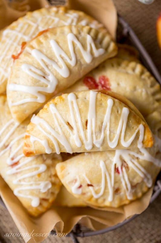 Half moon hand pies drizzled with icing