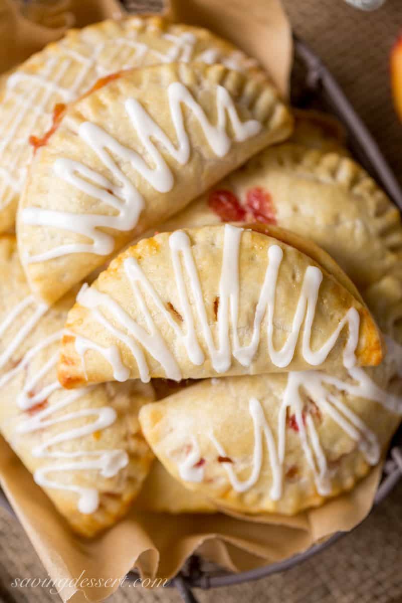 Peach hand pies with a drizzle of icing