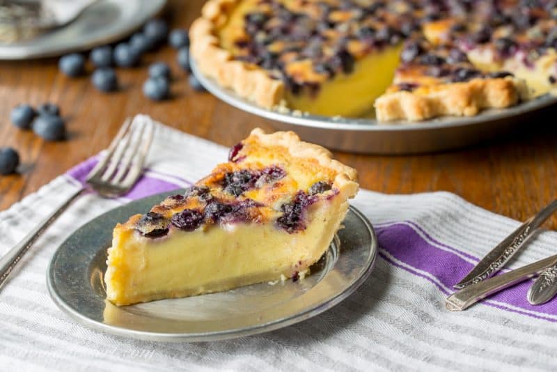 A slice of blueberry buttermilk pie