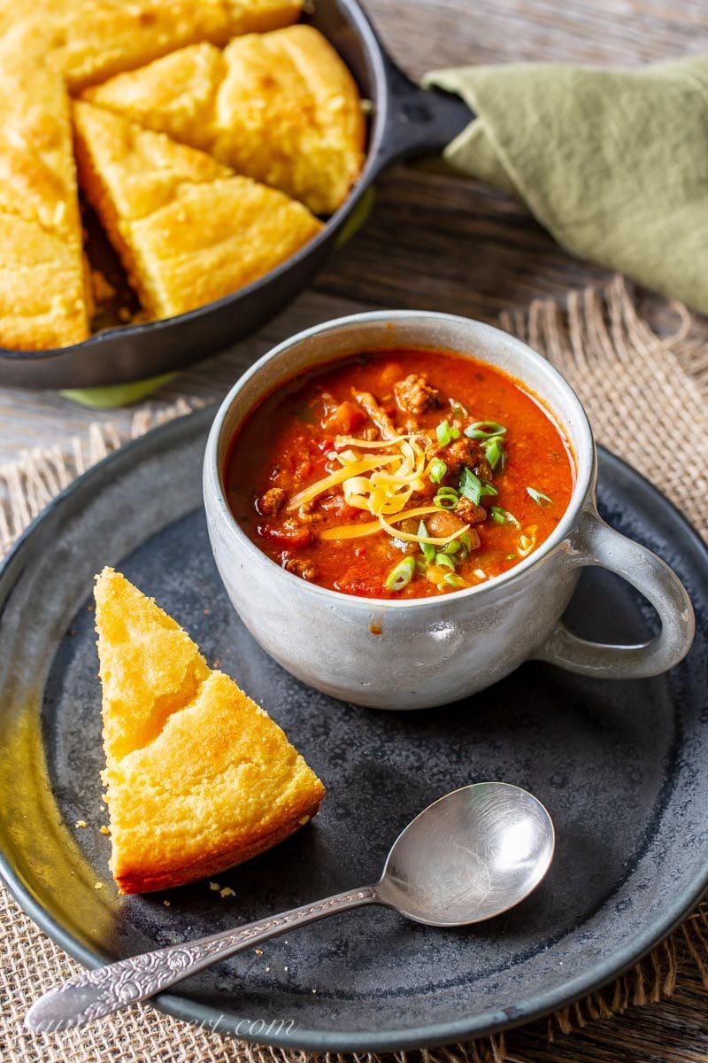 A cup of Famous Chasen's Chili with cornbread