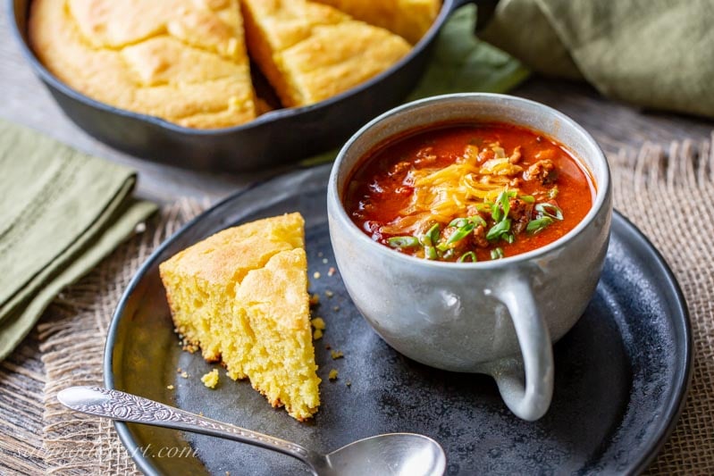 A cup of Chasen's Famous Chili with cornbread