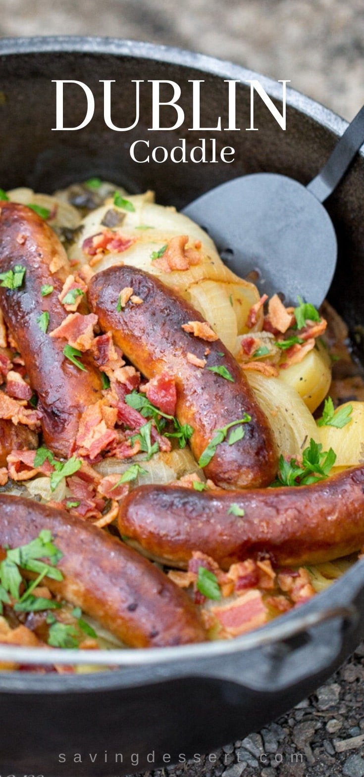 An outdoor Dutch Oven filled with Dublin Coddle, a layered casserole with potatoes, onions, bacon and sausage