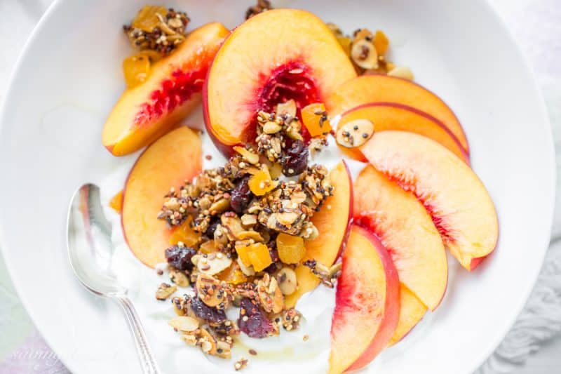 Quinoa Granola with oats, almonds, pepitas and dried fruit | www.savingdessert.com