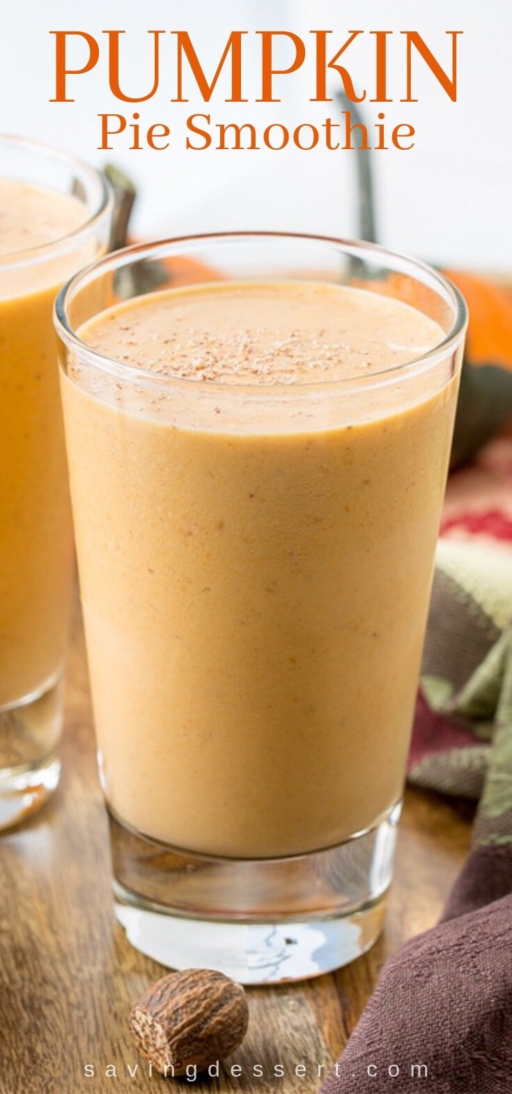 A glass filled with pumpkin pie smoothie