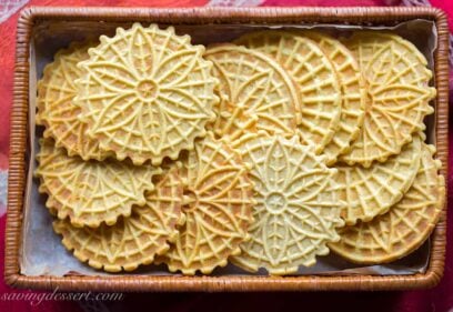 A basket filled with pumpkin pizzelles