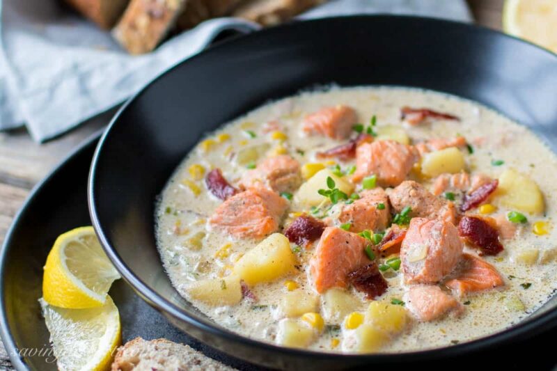Salmon Chowder with potatoes, bacon and corn - an incredible soup that's richly satisfying, hearty, surprisingly filling and not at all fishy! www.savingdessert.com