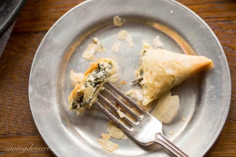 Spanakopita Recipe - the popular and delicious Greek recipe for Spinach and Feta Pie is now a finger-friendly appetizer! www.savingdessert.com