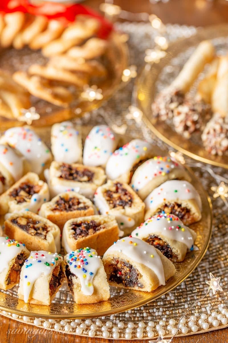 A holiday plate of Italian Fig Cookies with colorful sprinkles