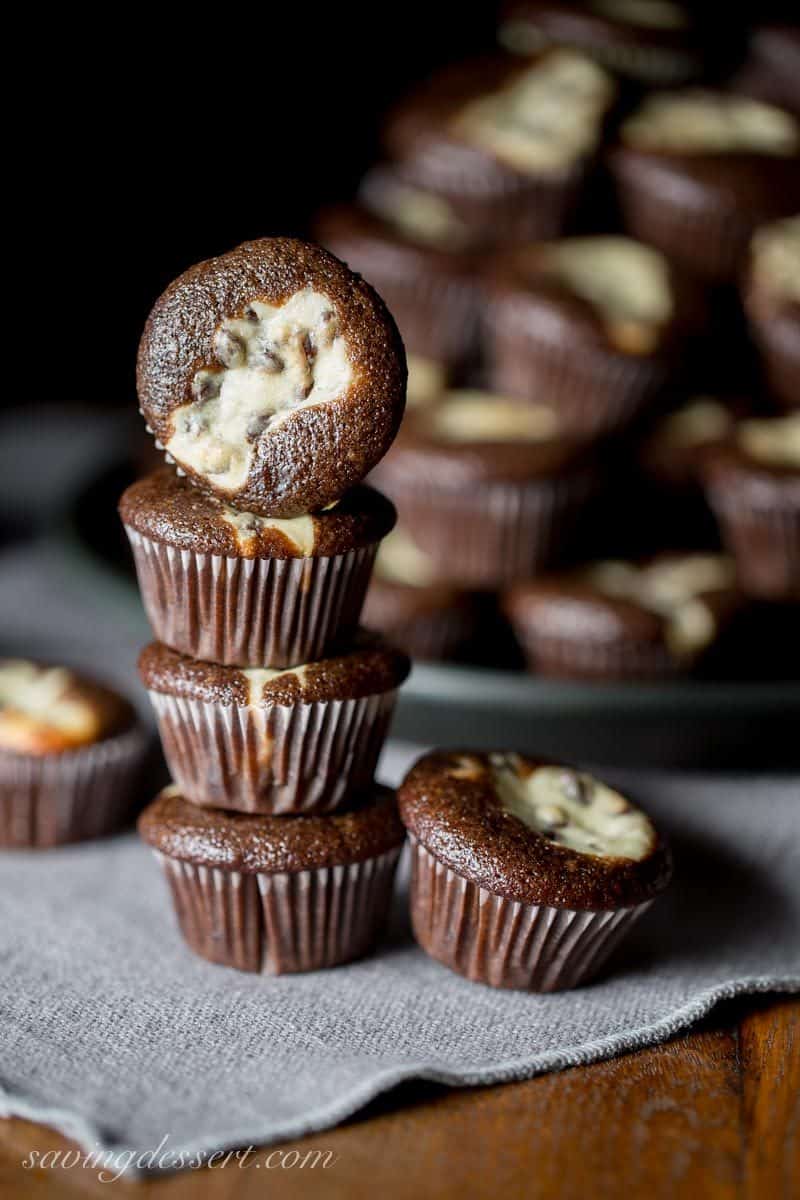 Mini Black Bottoms - a delicious fudgy cake topped with a cheesecake dough mixed with mini chocolate chips. So easy to make and super easy to eat! www.savingdessert.com 