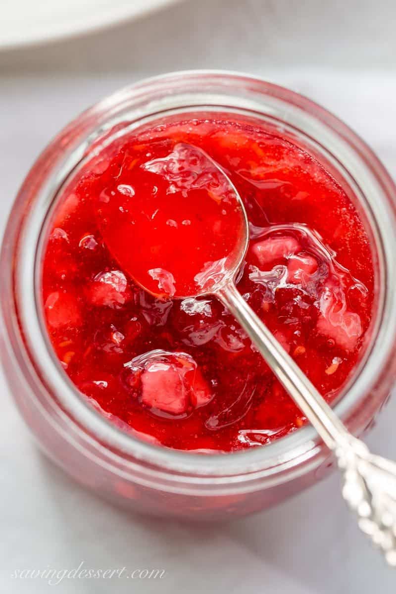 Holiday Freezer Jam - an unforgettable combination of cranberries, raspberries, and pears with a touch of orange juice and warm spices, finished with a happy splash of Grand Marnier! www.savingdessert.com