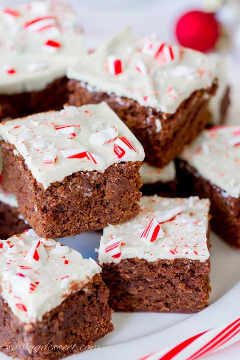White Chocolate Peppermint Brownies - Lightly sweet, cakey chocolate brownies topped with melted white chocolate and crushed peppermints for a simple, easy and tasty dessert to help celebrate the season. www.savingdessert.com