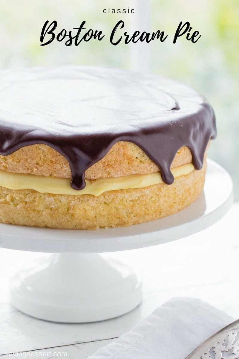 Classic Boston Cream Pie ~ moist, tender sponge cake filled with a layer of rich, smooth vanilla pastry cream, then topped with a delicious bittersweet chocolate glaze. #bostoncreampie #cake #savingroomfordessert #bostonpie #creampie www.savingdessert.com