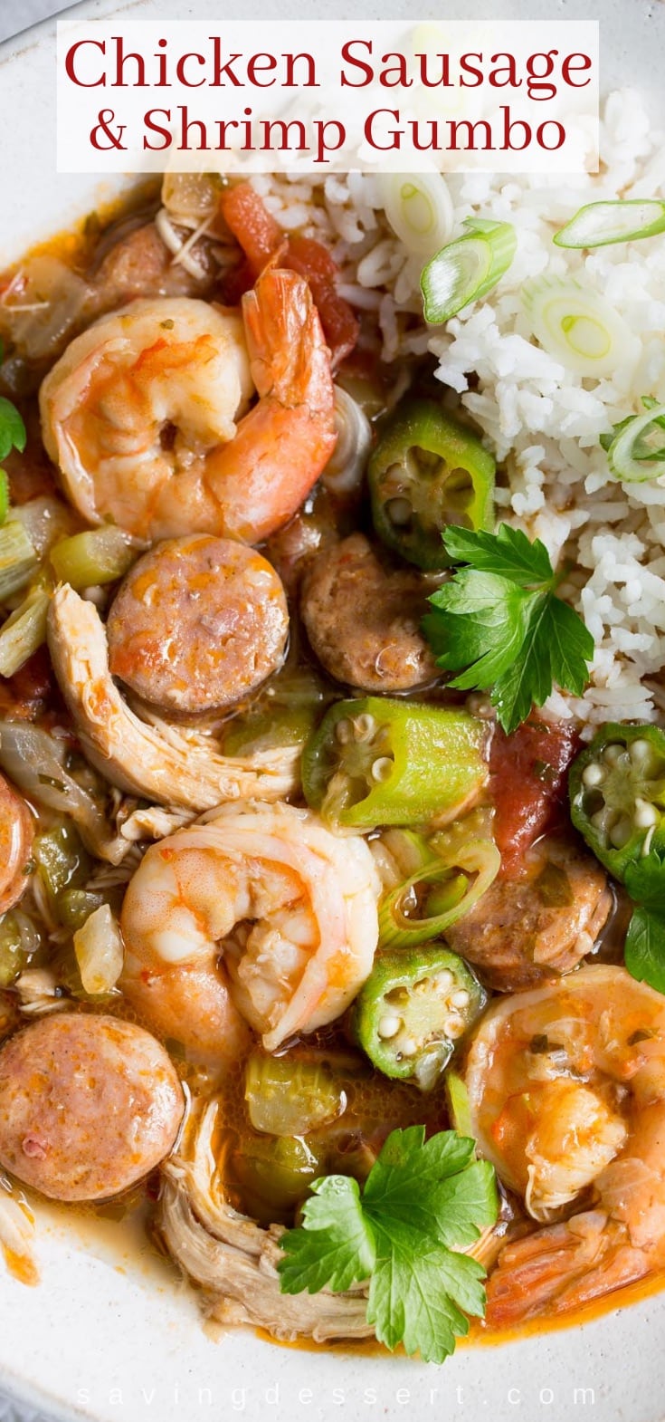 A bowl of chicken, sausage and shrimp gumbo over rice