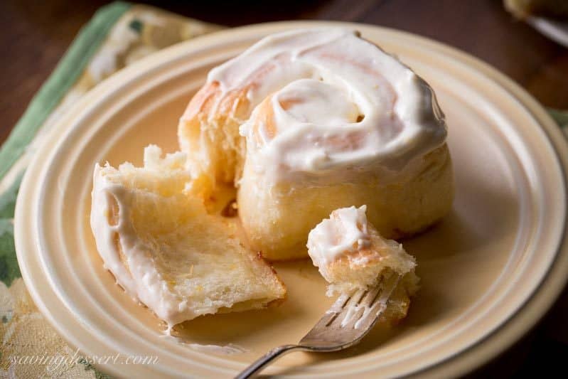 Lemon Sweet Rolls with Lemon Cream Cheese Icing ~ a lightly sweet, soft yeast roll with a lemon infused dough, and a sweet lemon filling, topped with a lemony cream cheese icing. Weekend baking at it's best! www.savingdessert.com