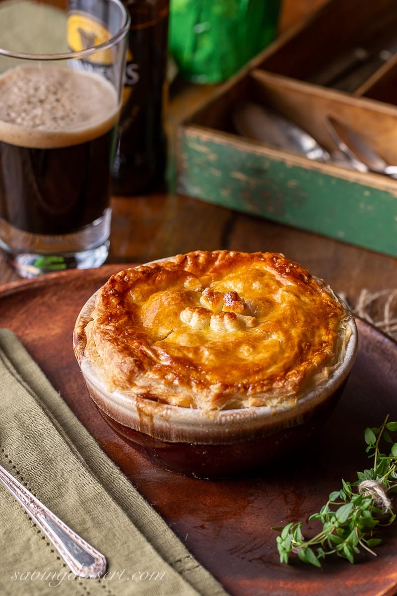 A bowl of Irish beef stew with puff pastry on top