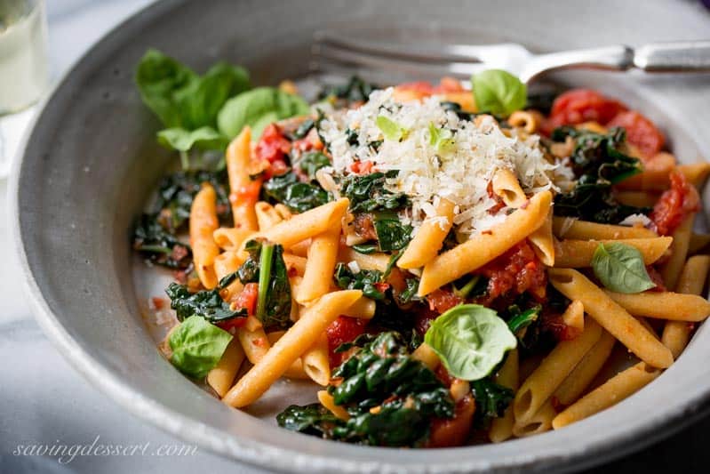 Spicy Pomodoro Sauce with Kale & Penne ~ a flavorful and healthy Meatless Monday meal that will leave you full, and satisfied. With just a few healthy ingredients and about 45 minutes, you can enjoy this spicy and delicious dish, and feel good about eating it too! www.savingdessert.com