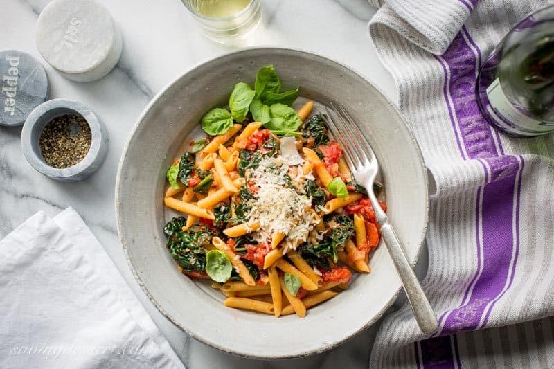 Spicy Pomodoro Sauce with Kale & Penne ~ a flavorful and healthy Meatless Monday meal that will leave you full, and satisfied. With just a few healthy ingredients and about 45 minutes, you can enjoy this spicy and delicious dish, and feel good about eating it too! www.savingdessert.com