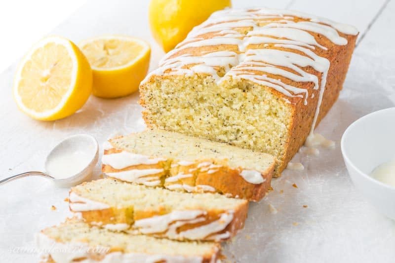 Lemon Poppy Seed Bread ~ a super easy quick bread packed with poppy seeds and lemon then topped with a simple lemon glaze. A delightful and delicious loaf cake great served with breakfast, brunch, afternoon tea or even dessert. www.savingdessert.com