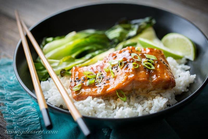 Teriyaki Salmon Rice Bowls with roasted Bok Choy ~ a super easy, quick and delicious dinner with terrific (almost intense) flavor from the simple homemade teriyaki sauce. Once you try this recipe, I bet you never buy pre-made teriyaki sauce again! www.savingdessert.com