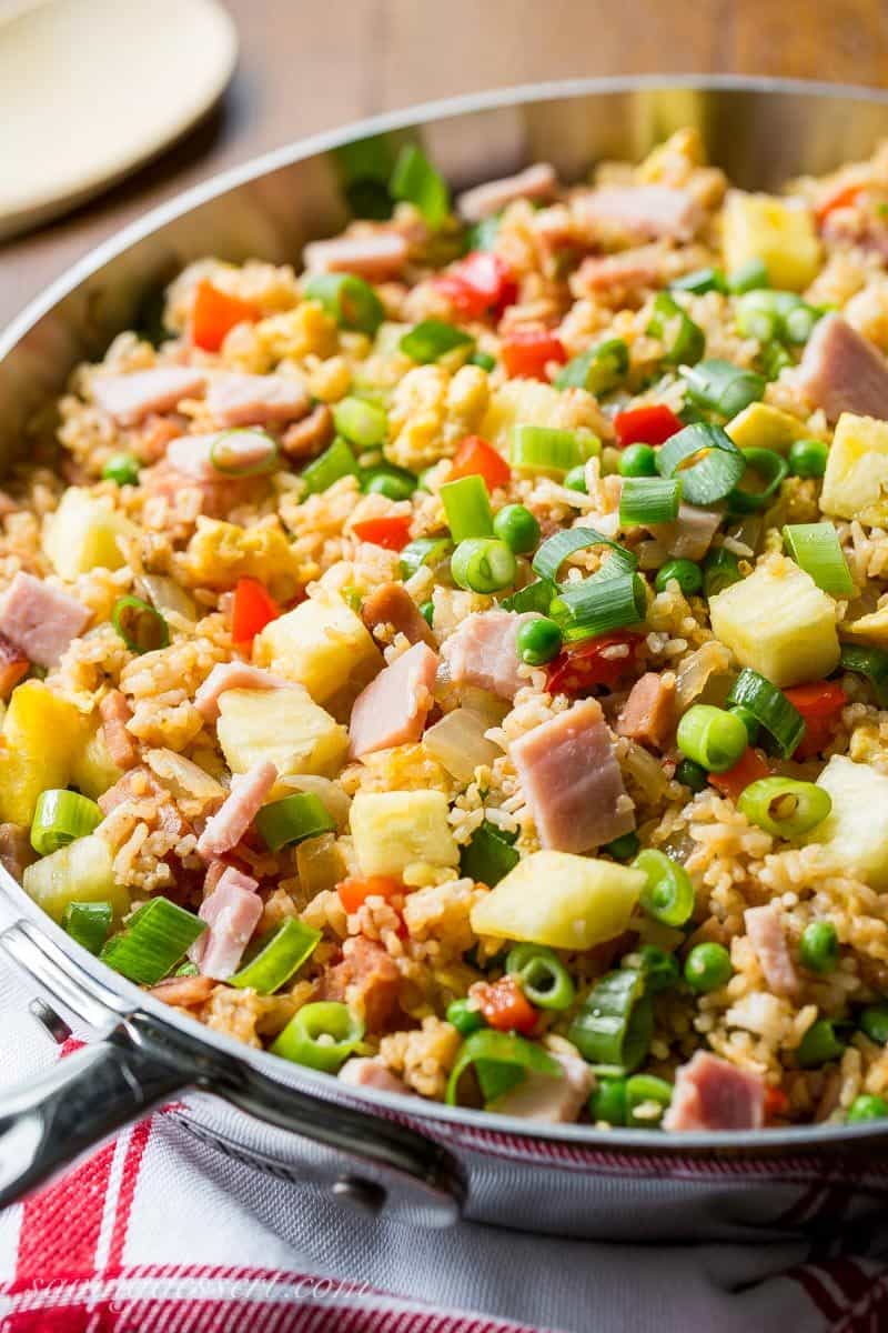 Hawaiian Fried Rice ~ the classic combination of sweet pineapple with salty ham is a winner in this traditional fried rice. Loaded with vegetables, you'll love this easy meal and may just find yourself enjoying leftovers for breakfast! www.savingdessert.com