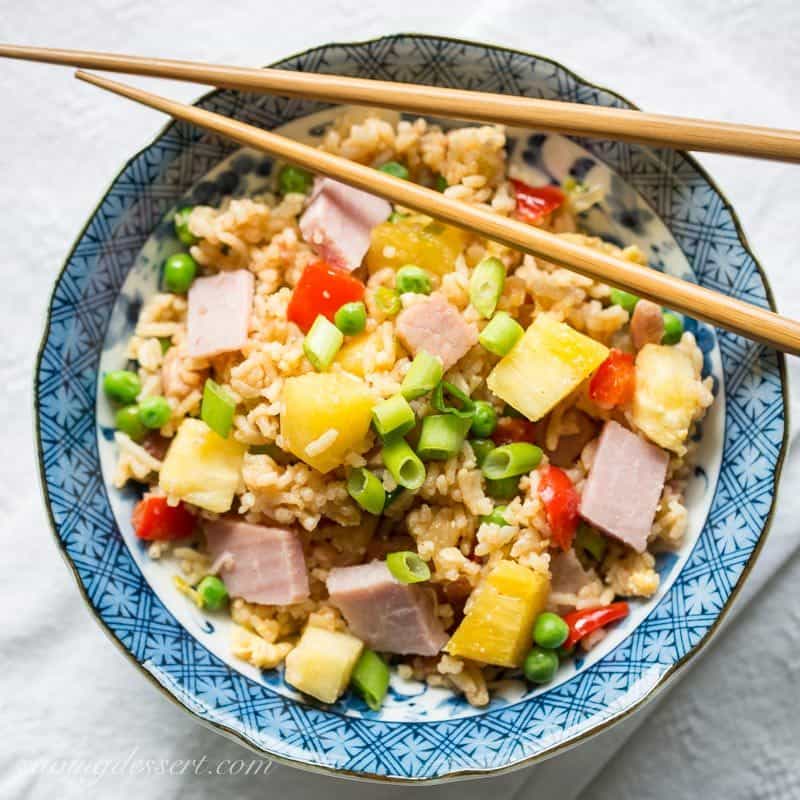 Hawaiian Fried Rice ~ the classic combination of sweet pineapple with salty ham is a winner in this traditional fried rice. Loaded with vegetables, you'll love this easy meal and may just find yourself enjoying leftovers for breakfast! www.savingdessert.com