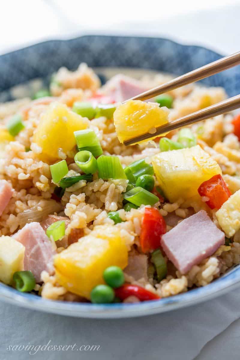 Hawaiian Fried Rice ~ the classic combination of sweet pineapple with salty ham is a winner in this traditional fried rice. Loaded with vegetables, you'll love this easy meal and may just find yourself enjoying leftovers for breakfast! www.savingdessert.com
