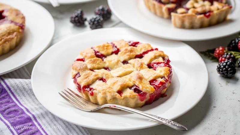 Blackberry Tarts ~ Garden to Table - juicy, ripe blackberries nestled in a buttery, flaky crust for an iconic, all American summer dessert. www.savingdessert.com