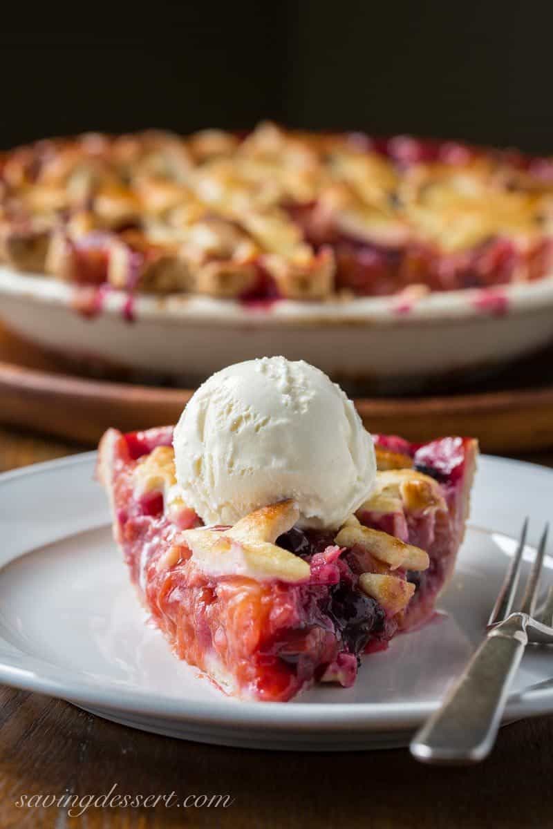 Nectarine Blueberry Pie ~ bake the season with this juicy, tangy, sweet pie filled with ripe nectarines and plump blueberries. Topped with a homemade flaky crust cut into shapes with your favorite cookie cutter, you'll be the star of your next celebration with this delicious dessert! www.savingdessert.com