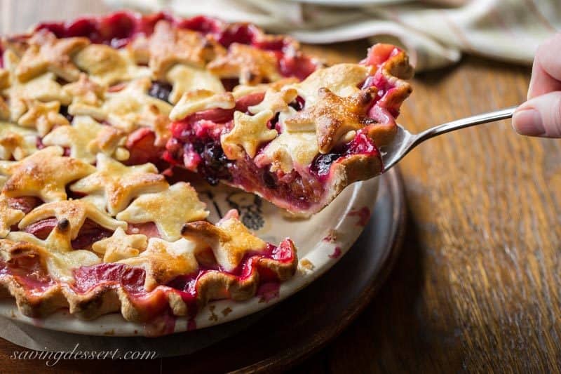 Nectarine Blueberry Pie ~ bake the season with this juicy, tangy, sweet pie filled with ripe nectarines and plump blueberries. Topped with a homemade flaky crust cut into shapes with your favorite cookie cutter, you'll be the star of your next celebration with this delicious dessert! www.savingdessert.com