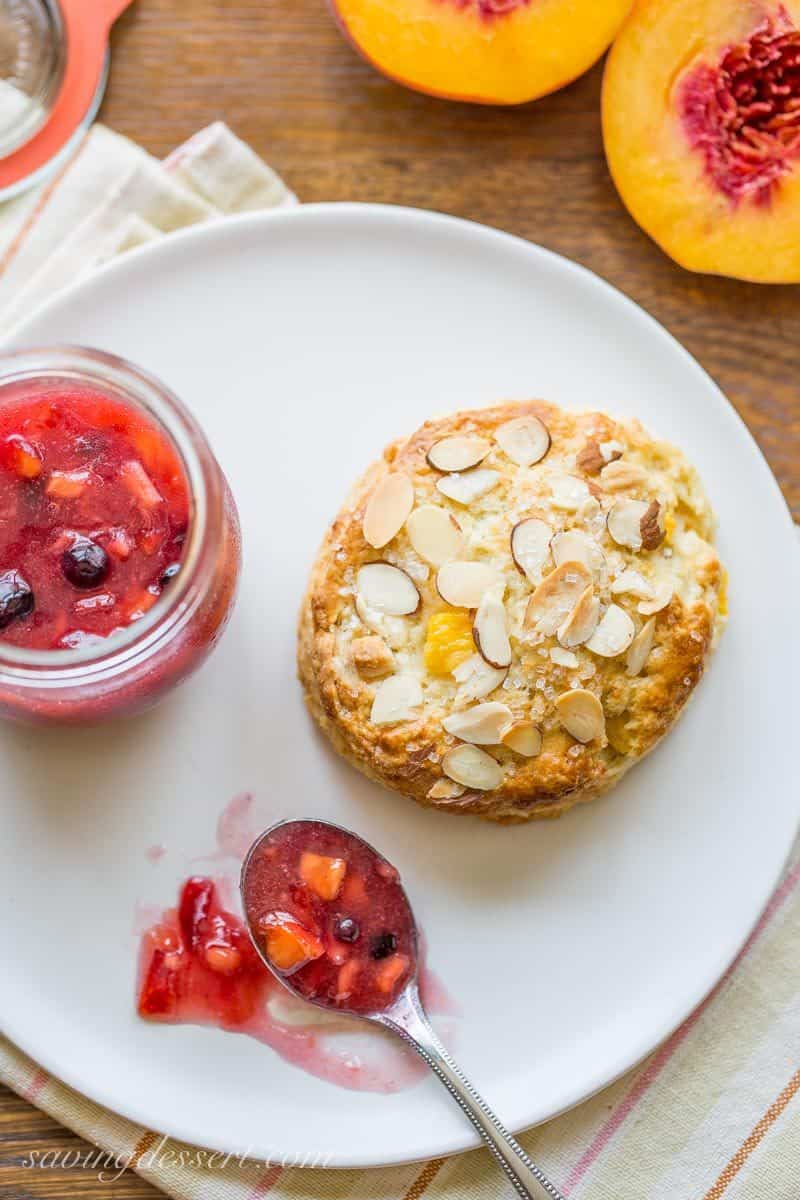 Almond Peach Scones ~ made with fresh diced peaches, grated almond paste and amazing buttermilk, these scones are tender and delicious and super easy to make too! www.savingdessert.com