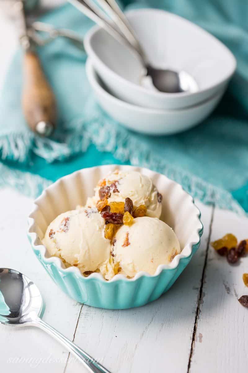 Rum Raisin Ice Cream ~ a classic summer treat with plump, rum soaked raisins and a rich custard base loaded with vanilla beans. www.savingdessert.com