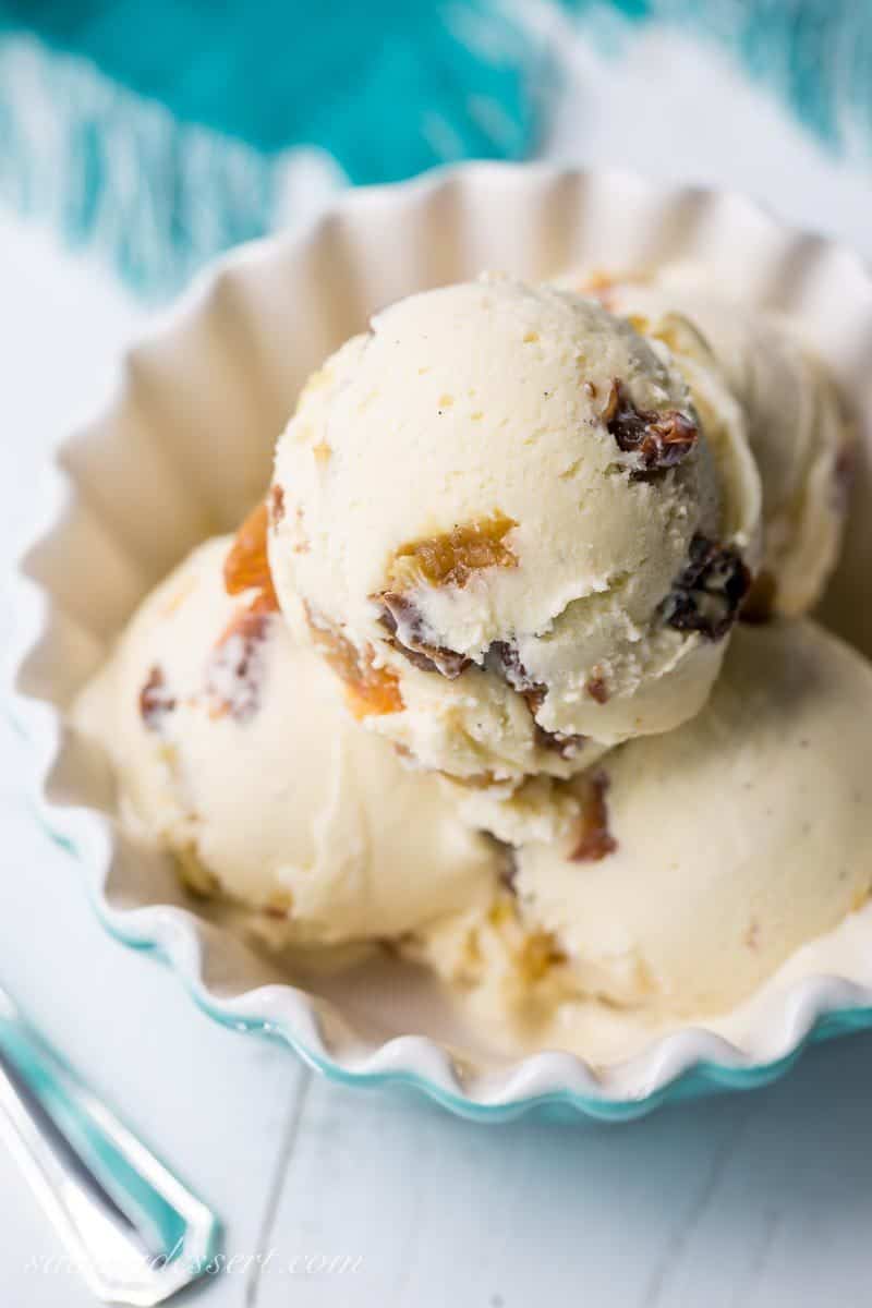 Rum Raisin Ice Cream ~ a classic summer treat with plump, rum soaked raisins and a rich custard base loaded with vanilla beans. www.savingdessert.com