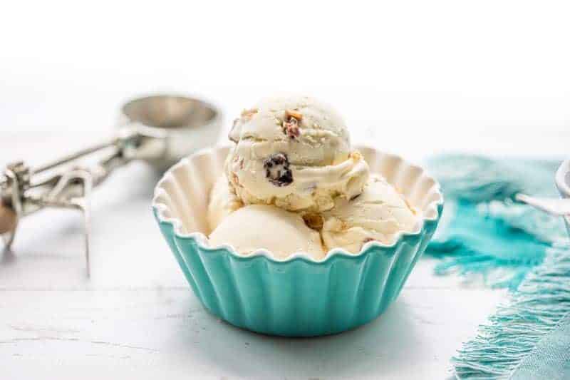 Rum Raisin Ice Cream ~ a classic summer treat with plump, rum soaked raisins and a rich custard base loaded with vanilla beans. www.savingdessert.com