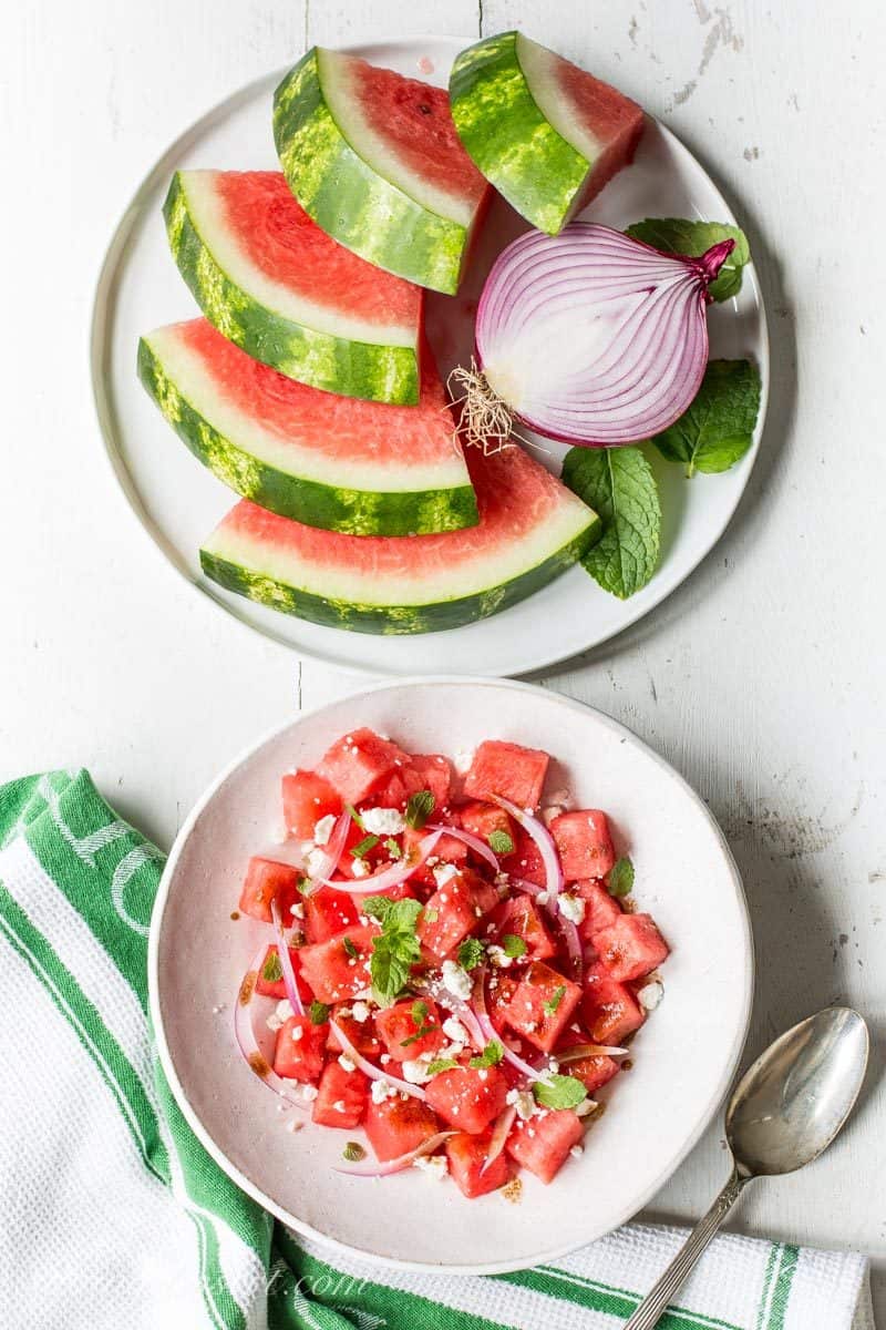 Watermelon Salad with Balsamic Vinaigrette ~ you won't believe how perfectly sweet summer watermelon combines with fresh mint, crisp red onions and creamy Feta cheese.  With just a drizzle of balsamic vinaigrette, you'll be amazed at the delicious flavor that comes from just a few simple ingredients. www.savingdessert.com