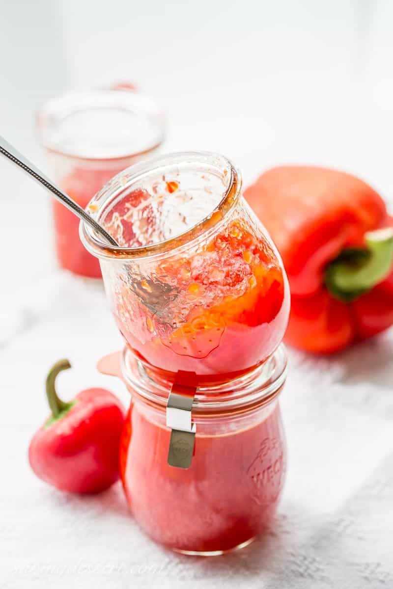 Hot Pepper Jelly ~ spicy, hot red cherry peppers and sweet red bell peppers combine in this easy and delicious jelly ... perfect for the season! savingdessert.com #savingroomfordessert #hotpepperjelly #appetizer #jelly #redpepper