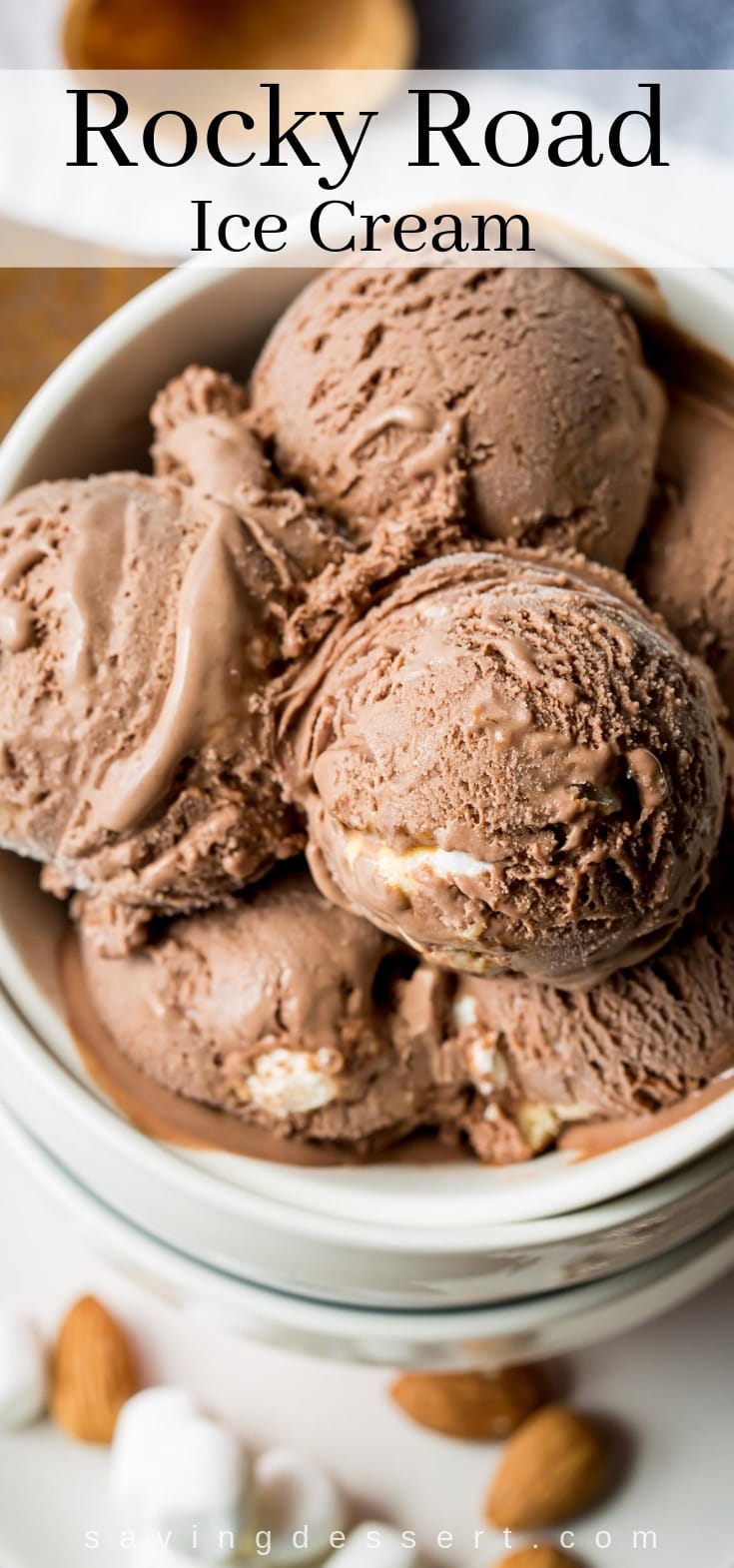 A bowl of homemade chocolate Rocky Road Ice Cream with marshmallows and almonds