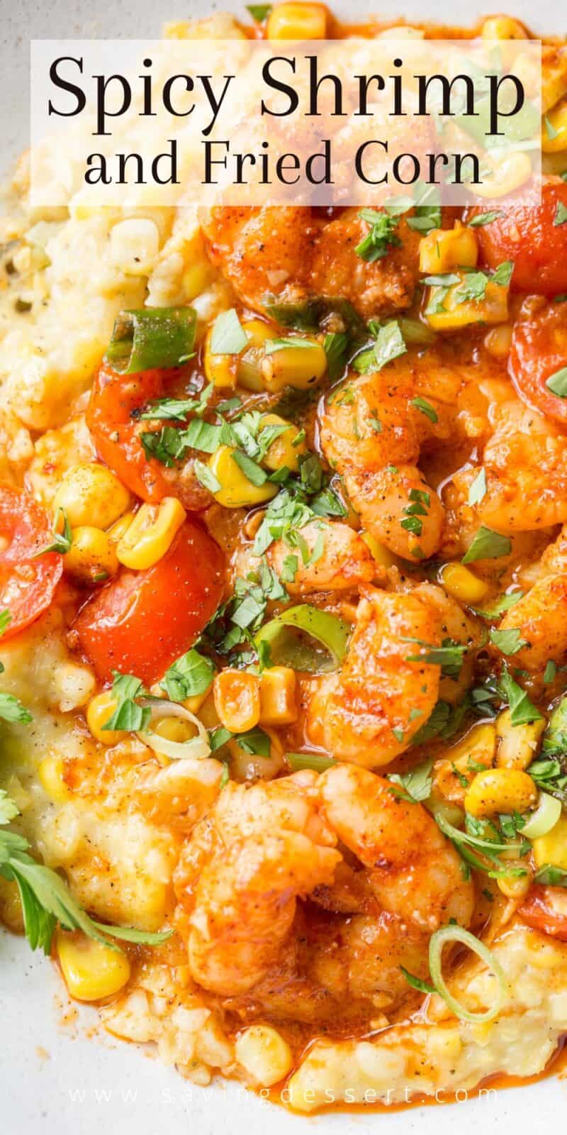 A bowl of fried Corn topped with spicy shrimp, tomatoes and onions