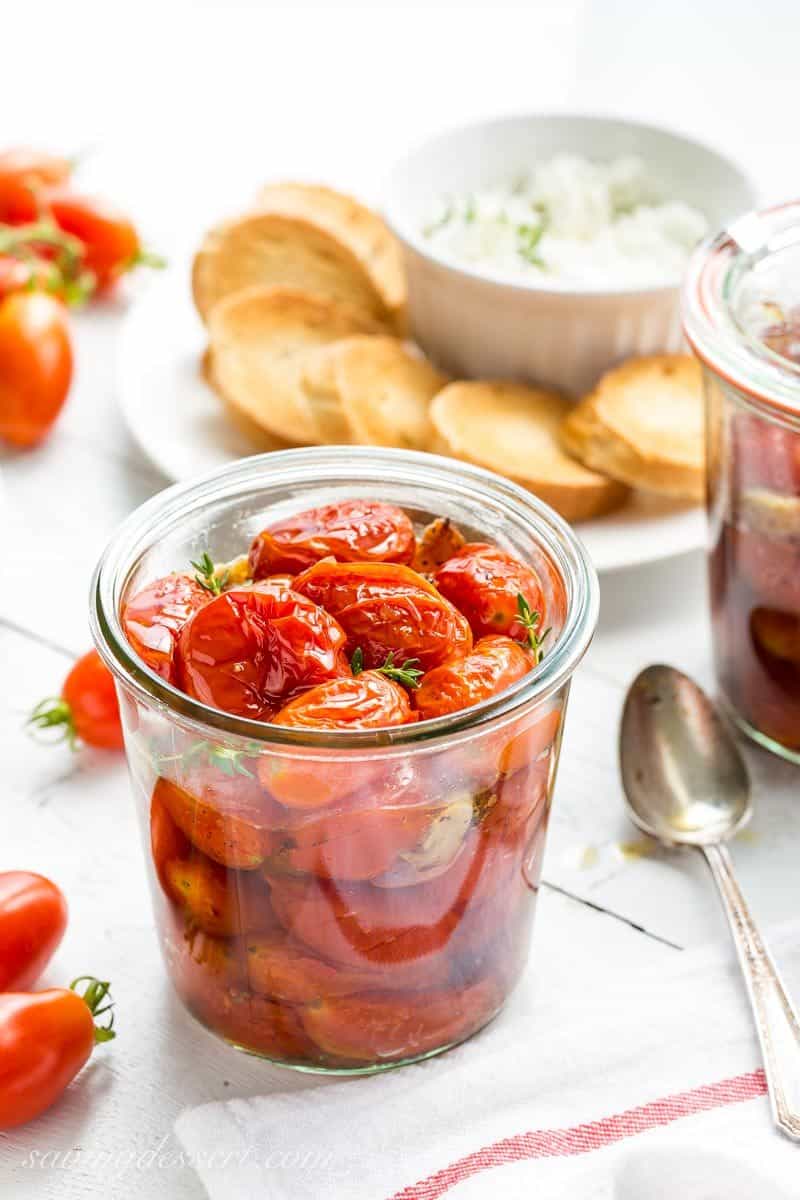 Sweet summer tomatoes are slow cooked in the oven with olive oil, garlic, crushed red pepper and a handful of fresh thyme.  www.savingdessert.com