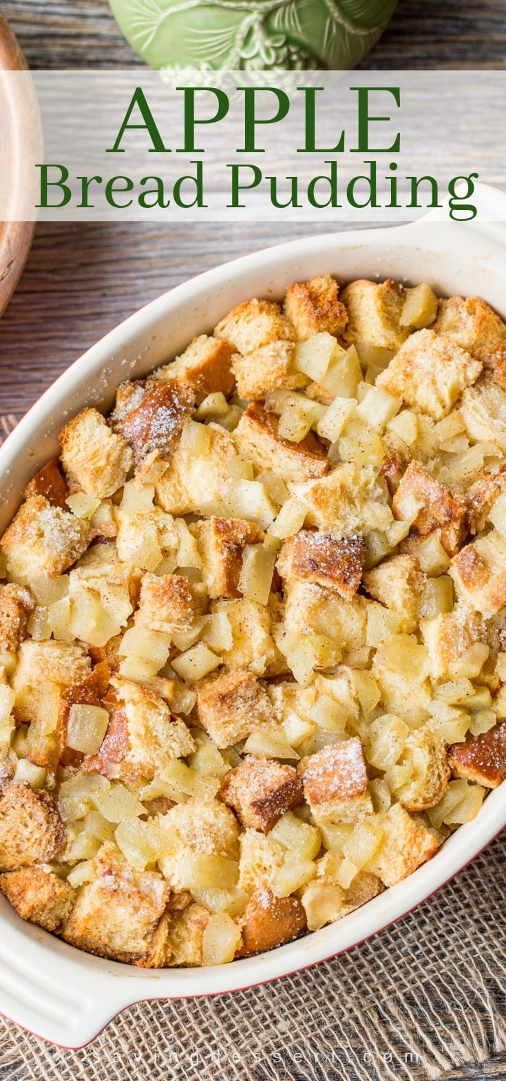 Close up of a casserole dish filled with apple bread pudding