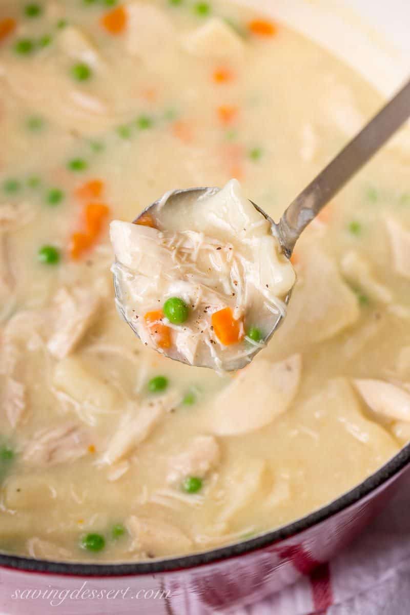 Homemade Chicken and Dumplings ~ a deliciously rich homemade chicken stock is used for the base of this warming, healing pot of pure southern comfort food. www.savingdessert.com #savingroomfordessert #chickenbroth #chickenstock #chickenanddumplings #dumplings #dinner #chicken