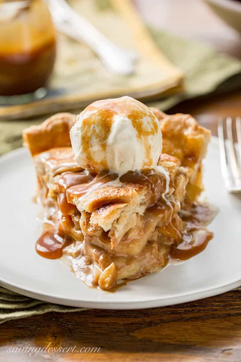 Caramel Apple Pie ~ a delicious twist on a classic apple pie.  The pie is lightly sweetened with a creamy caramel sauce, then served with an extra drizzle on top.  www.savingdessert.com #savingroomfordessert #applepie #pie #apple #caramelapple #caramelapplepie